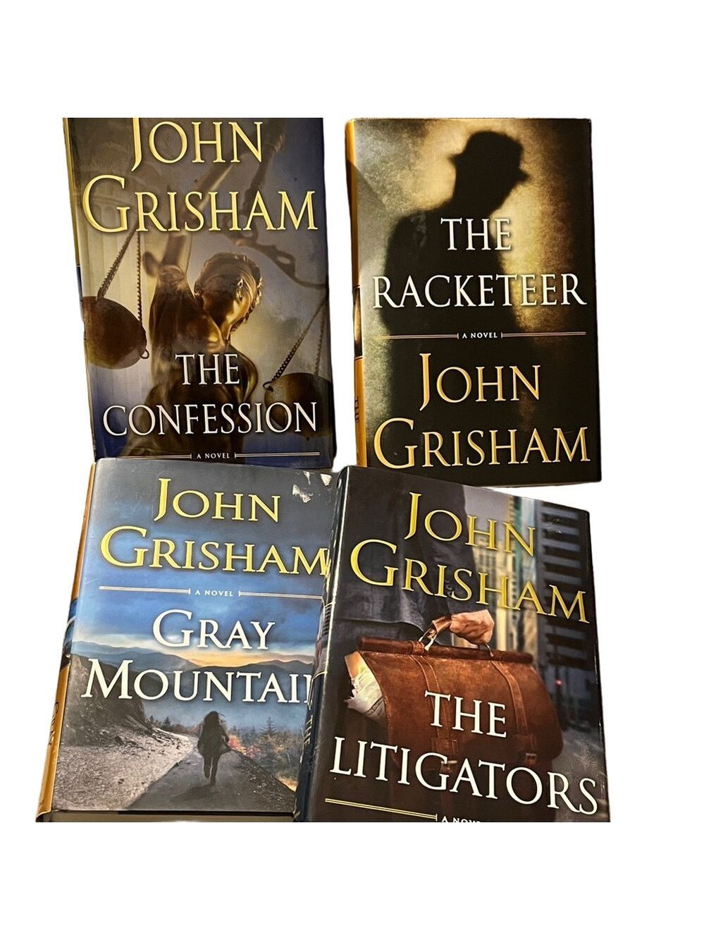 John Grisham Hardcover Book Set - Blue, Black, Gray Covers